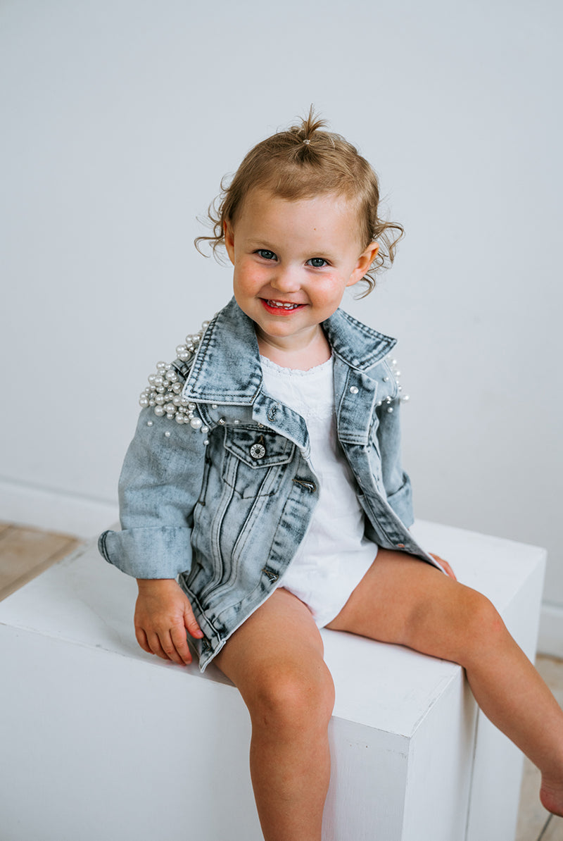 Personalised kids pearl denim jacket, embroidered name detail
on back